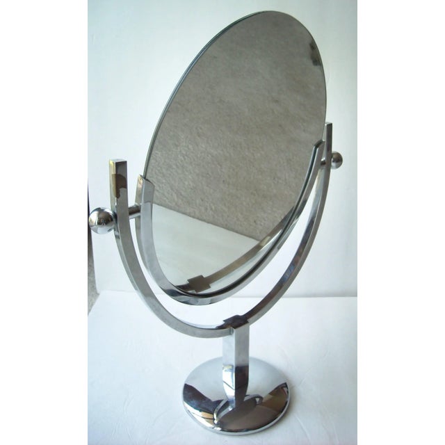 Nice vintage chrome vanity mirror by Charles Hollis Jones. Light lost chrome in back.