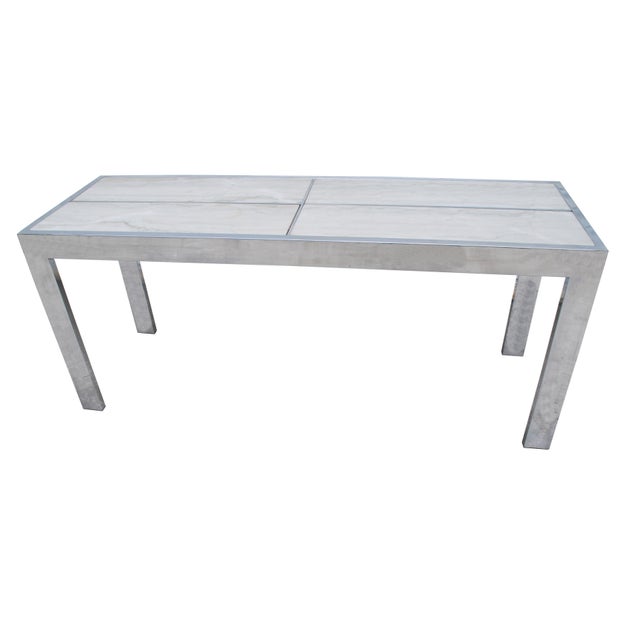 6-foot midcentury Baughman style console table with a chrome frame and Carrara marble inlays.