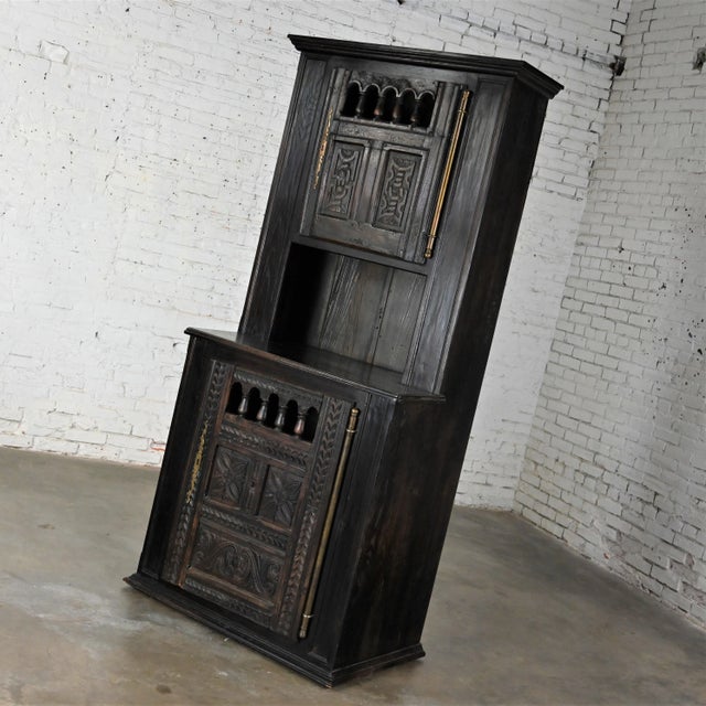 Fantastic vintage Spanish Colonial Revival style oak cupboard, hutch, cabinet, or dry bar comprised of hand carved oak,...