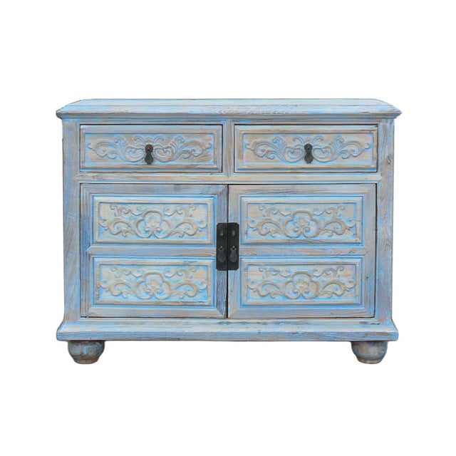 Bring effortless charm and functional elegance to your home with this beautifully distressed wooden accent cabinet....