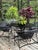 Gorgeous MCM time-capsule painted wrought iron, garden patio dining set with round, sunburst table and four strap iron...