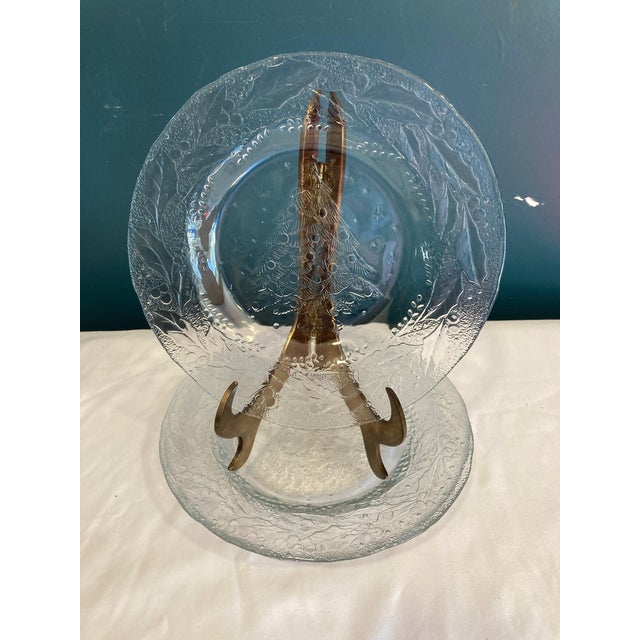 A delightful set of vintage finds perfect for holiday entertaining. These clear glass plates feature intricately embossed...