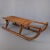 A charming, handcrafted antique/vintage sled, estimated to date back to the 1940s or earlier. This piece is a true...