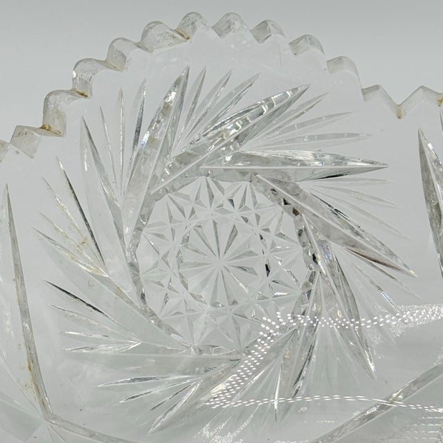 Deeply cut glass always brings a table to life, and this vintage serving bowl delivers that sparkle beautifully. Featuring...