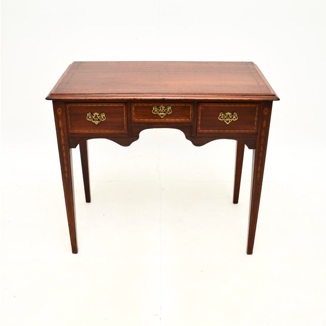 A beautiful antique Georgian period lowboy side table. This was made in England, it dates from around the 1790-1810...