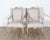 A wonderful pair of Gustavian style armchairs from Sweden, dating to the early 20th century, masterfully carved and full...