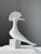 The figurine has a slightly chipped beak and manufacturing imperfections on the beak and on the underside of the tail, all...