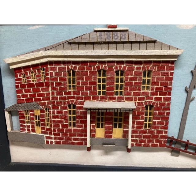 Son recreated his family brick home on particle board. He used scrap wood from remodeling of farmhouse to create the...