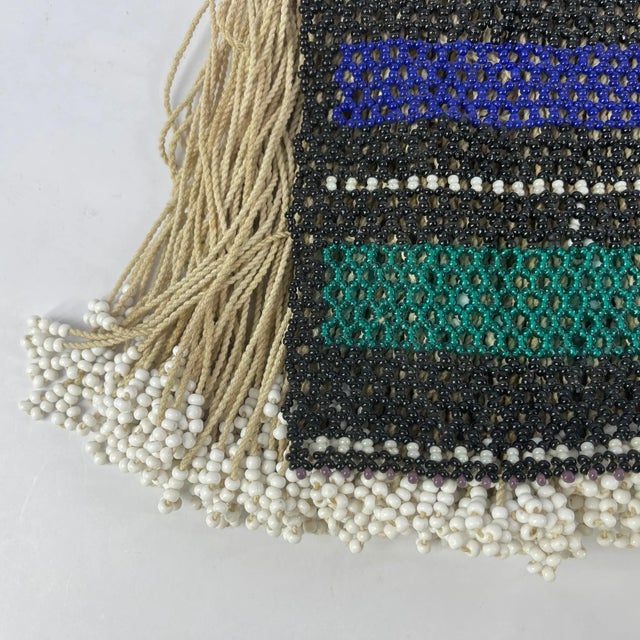 This Ndebele beaded girlsâ skirt from South Africa is a vibrant example of traditional beadwork associated with...