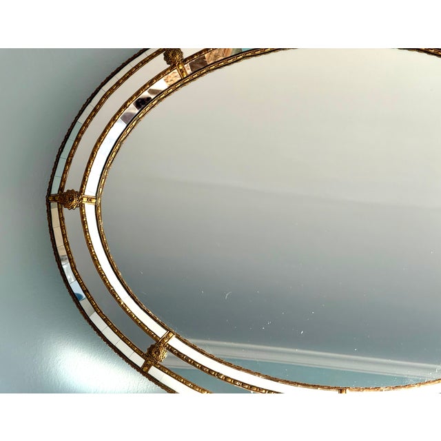 Hollywood Regency Oval Wall Mirror With Brass Accents For Sale In New York - Image 6 of 12