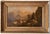 This is a 19th-century oil painting of a mountain landscape attributed to Albert Bierstadt. The painting depicts a serene...