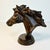 This cast iron Horse Bust Sculpture is stunning. The horse face and mane is highly detailed and stunning in its shape and...