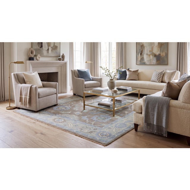 Elevate luxury interiors with this contemporary Oushak-style area rug, meticulously hand-crafted from premium natural...