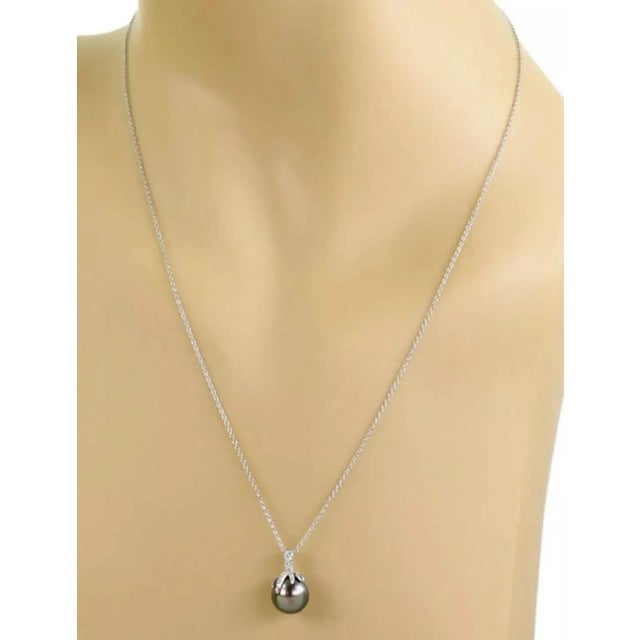 Brand: Tiffany & Co. Hallmark: Tiffany & Co. Pt950 Gems: Diamond approx 0.15ct & Pearl Material: platinum Measurement:...