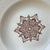 French faience soup plate signed Salins, circa 1890. Decorated with snowflakes. 8 plates available.