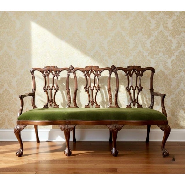 Elegant carved wood bench settee brings classic Chippendale-inspired style to any foyer, dining room, or living space....