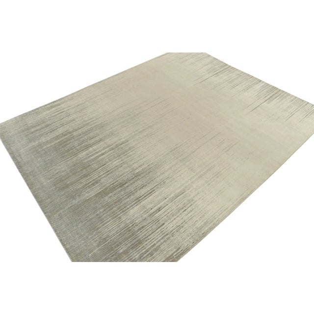 Hand-knotted in wool, a fabulous 12x15 abstract rug from Rug & Kilim’s bold additions to their modern collections. On the...