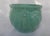 A lovely midcentury McCoy cachepot/planter in a diamond quilted pattern with a laurel leaf garland under the top rim and...