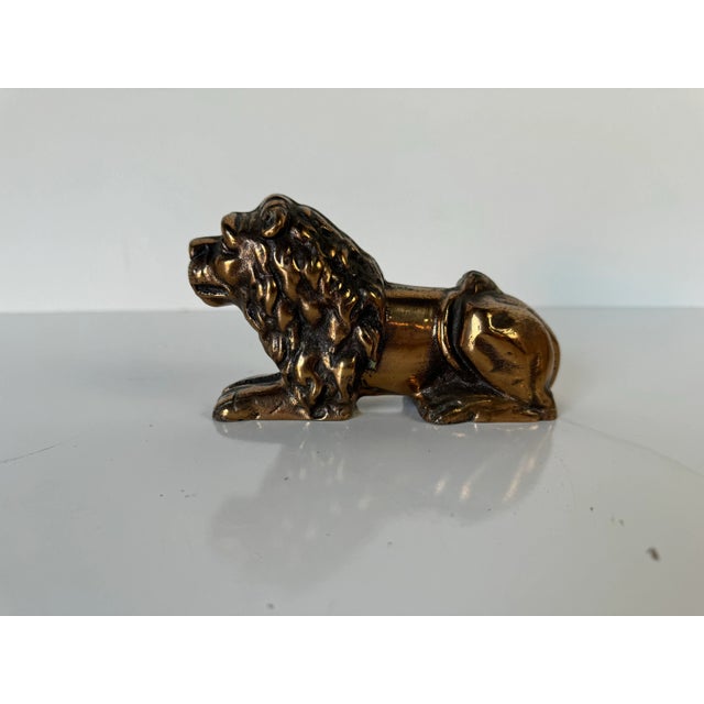 I'm pleased to offer for sale this Magnificent Vintage heavy bronze lying lion statue figurine - sculpture. A recumbent...