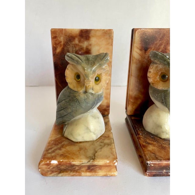 Here is a wonderful pair of bookends that were made in Italy in the mid-century. They are made from hand-carved alabaster...