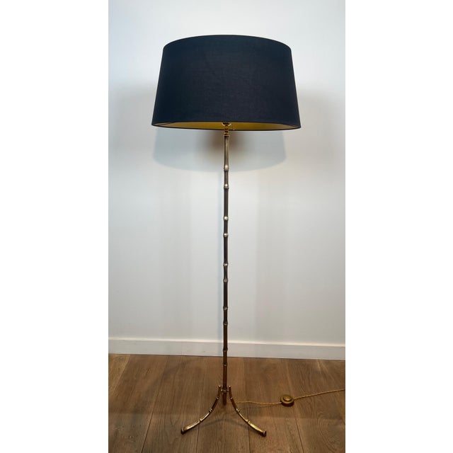 This beautiful faux bamboo floor lamp is made of bronze. French work by Maison Bagués. Circa 1940