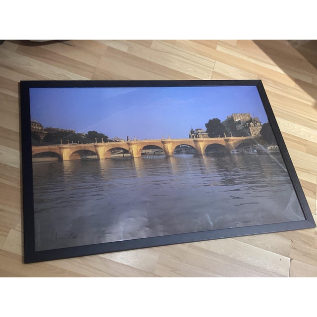Christo, The Pont Neuf Wrapped, hand-signed offset print. Good condition, with some minor signs of wear, as shown in the...