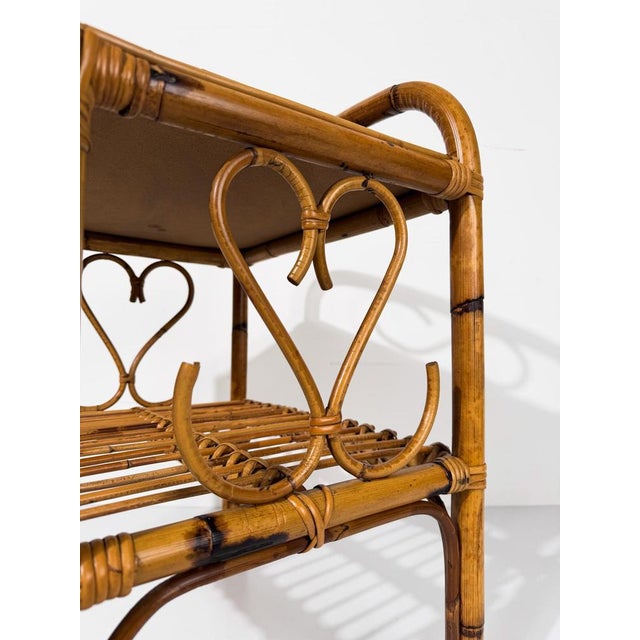 Italian Mid-Century bedside table, an evocative example of the natural fiber furnishings that defined Mediterranean...