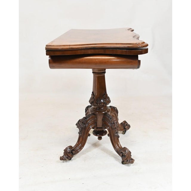You are viewing a gorgeous period Victorian card or games table in walnut We date this fine piece of English furniture to...