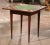 Decorate a game room or a den with this elegant folding card table. Crafted in France circa 1930 and built of mahogany...