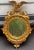 This is a pair of carved giltwood eagle mirrors with Federal styling in very good condition. They are Italian and most...