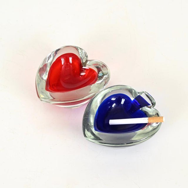 Striking pair of Italian Murano blown “sommerso” glass ashtrays or catchalls. This charming and unique set was designed by...