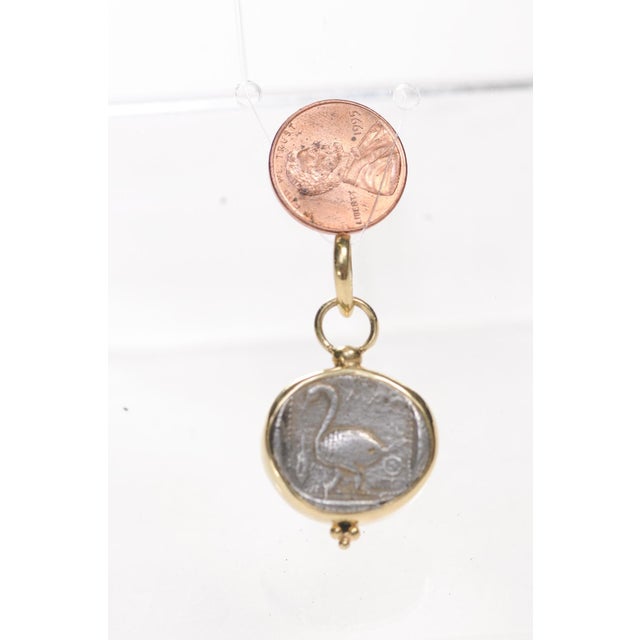 A rare Stater AR [coin] of a Swan with 18 karat gold trim and bail. This coin was minted at Cilicia, Mallos, Greece, circa...