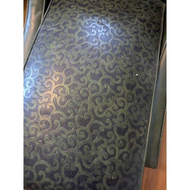 Description: A piece straight out of a 1960s therapist’s office. This vintage chaise lounge features sculpted arms,...