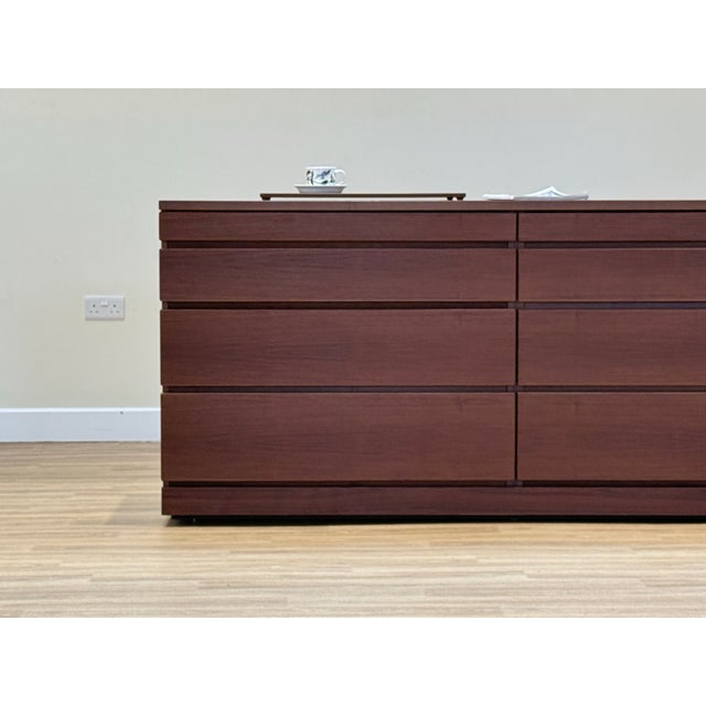 An elegant and beautifully crafted mid-century danish walnut chest of drawers, model sm88n nød, designed and manufactured...