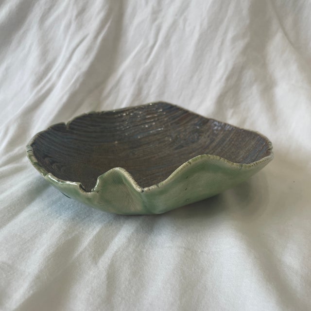 The handmade Katie Jae Faux Bois Decorative Ceramic Dish is a stylish addition to any home decor, featuring a unique Faux...