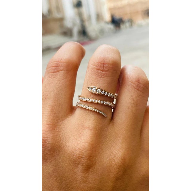 An 18K gold diamond wrap band represents a couple's unwavering love for one another. It demonstrates your unending love...