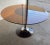 A Chromcraft Tulip Amber Glass Dining table with 3 Lucite Chairs. This amazing space-age dining set features a thick round...