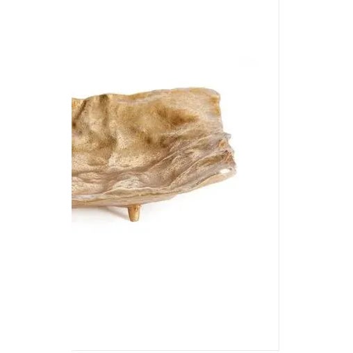 With all the delicate nuance of a soft cloth napkin, you'd never imagine this substantial decorative tray is made of a...