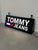 An impressive original Tommy Jeans illuminated advertising sign, formerly used as a retail display piece. Featuring the...