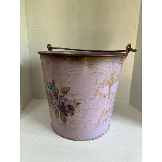 Vintage farmhouse purple metal bucket with flower decal. A beautiful rustic piece for your country or farmhouse decor....