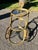 An exceptionally rare and sculptural three-tier rolling bar or serving cart designed by Aldo Tura and produced in Italy...