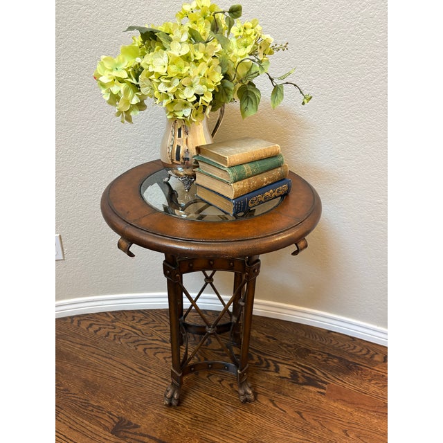Elegant late 20th-century leather and antiqued metal accent table attributed to Maitland-Smith, showcasing the...