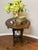 Elegant late 20th-century leather and antiqued metal accent table attributed to Maitland-Smith, showcasing the...