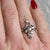 A magnificent witness to the French Art Nouveau era (circa 1910). This antique ring is crafted in 18k yellow gold and...