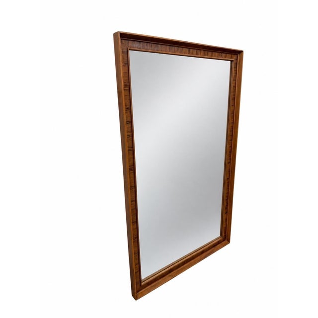 An exceptional and rare example of iconic Mid-Century Modern design! This stunning Kent Coffey PERSPECTA wall mirror,...