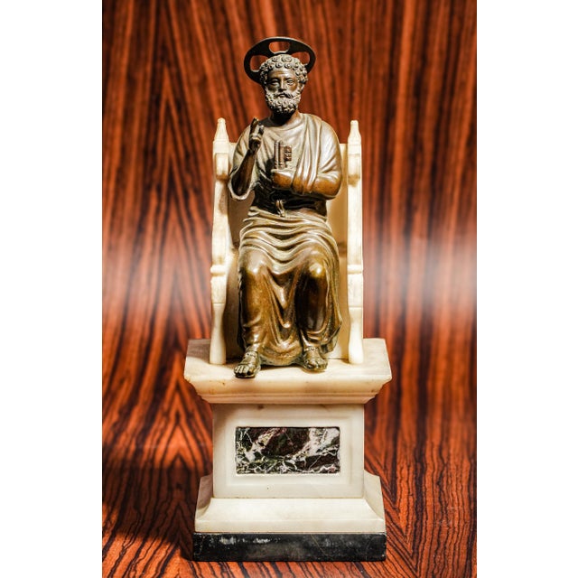 A superb example of 19th-century Grand Tour craftsmanship, this finely executed miniature statue pays homage to one of the...