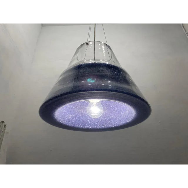 Contemporary acrylic light pendant shade is acrylic and comes with light blue crystals these crystals can be changed and...