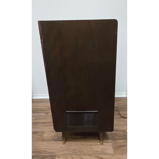 Stunning mid-century piece with incredible retro charm! This is a vintage Nordmende Caruso high-fidelity console cabinet,...