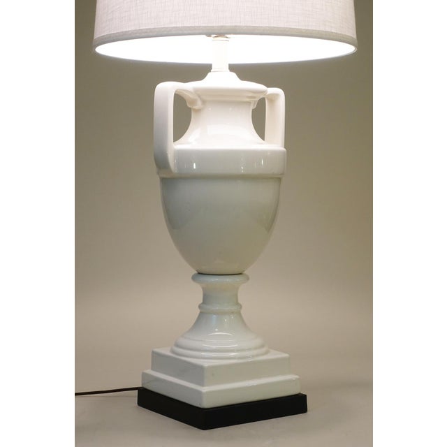 An impressive and visually stunning large Hollywood Regency Modern sculptural Trophy Urn form Milky White thick Porcelain...