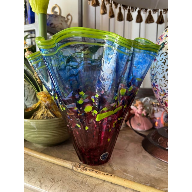 Vintage handblown Garcia Art glass vase. Art glass has a vibrant, multi-colored design with a ruffled "handkerchief" top....